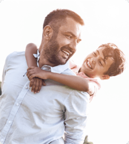 father and son smiling